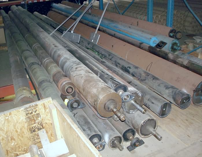 STEEL ROLLS, ~10" dia x 250" long.